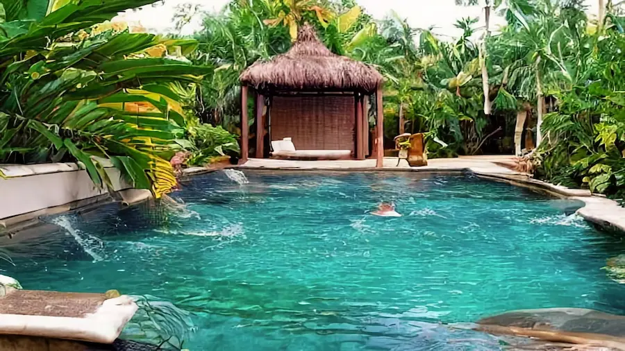 Ideas for backyard tropical pool landscaping including pool designs, deck ideas, landscaping, plants, and materials.